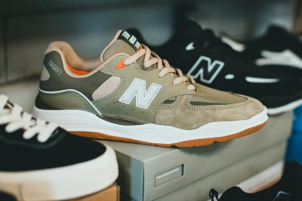 Close-up of New Balance sneakers on a shelf, showcasing modern design and style.